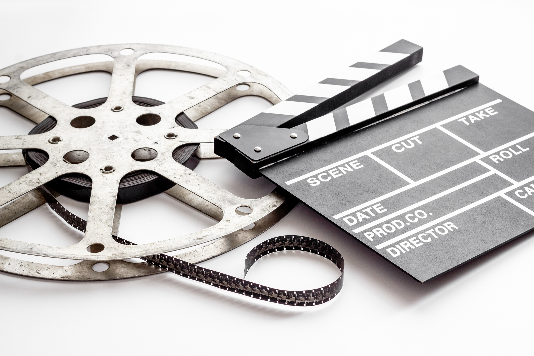 Movie clapper with film reel. Cinema background